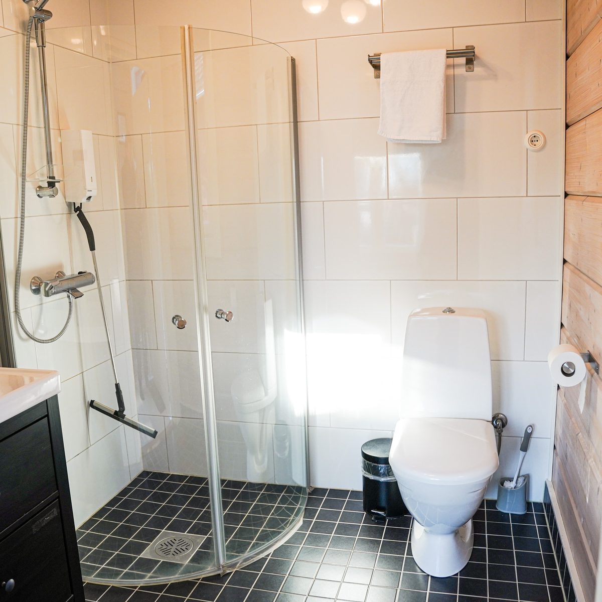 Private bathroom with shower and towels